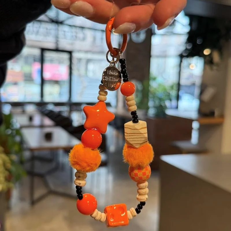 بند آویز ستاره نارنجی خزدار